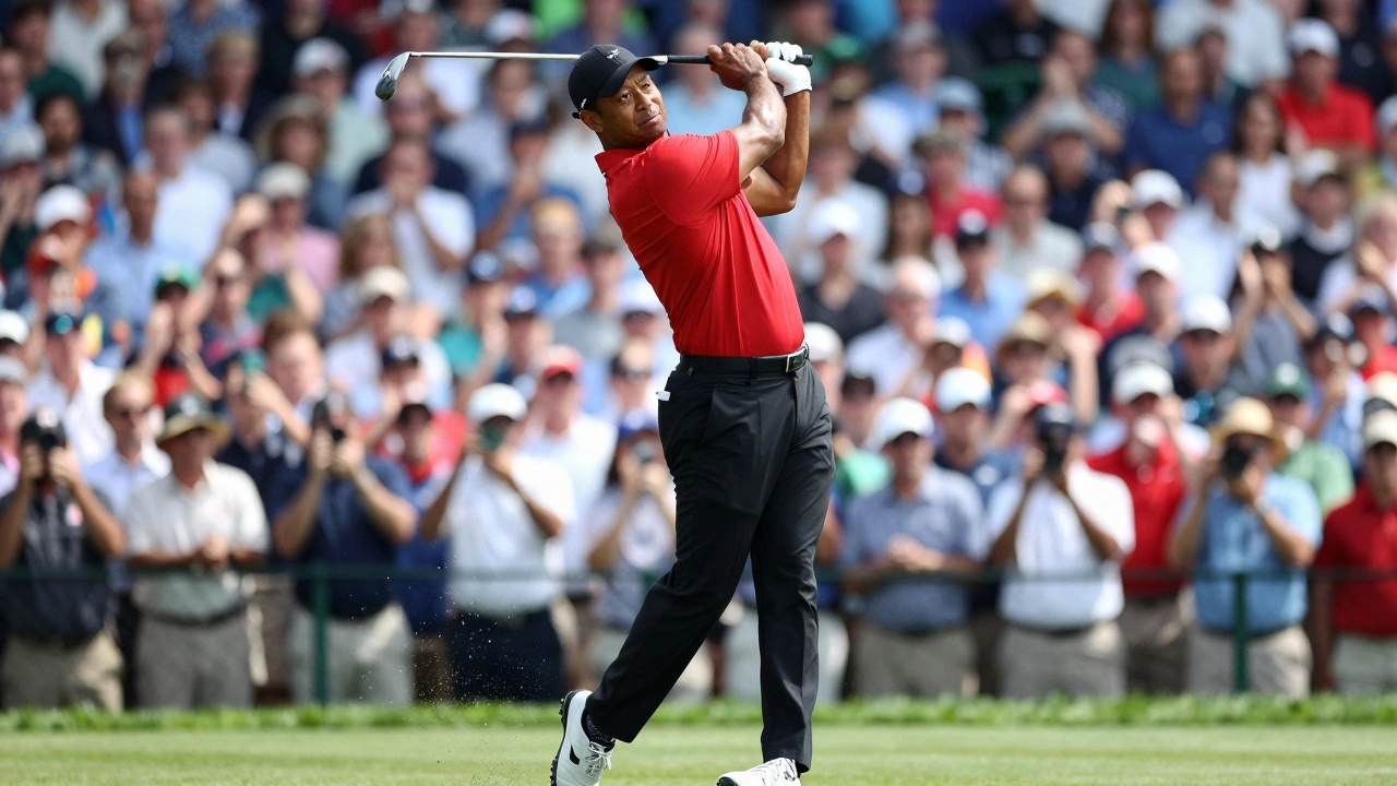 Tiger Woods swinging intensely before a huge crowd